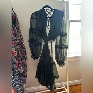 Green dress with cut outs & a cross cross tie back!